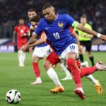 France's forward #10 Kylian Mbappe runs with the ball during the International friendly football match between France and Luxembourg at Saint-Symphorien Stadium in Longeville-les-Metz, eastern France, on June 5, 2024. (Photo by FRANCK FIFE / AFP)